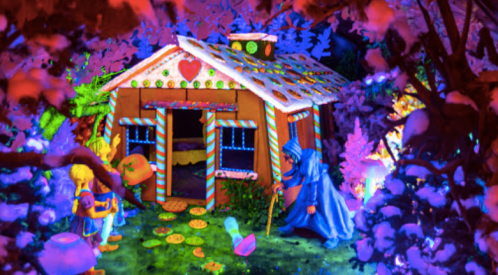 A colorful, whimsical gingerbread house surrounded by vibrant foliage and characters in a magical setting.
