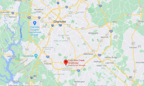 Map showing Four Mile Creek Greenway in Charlotte, NC, highlighting a walking trail and nearby landmarks.