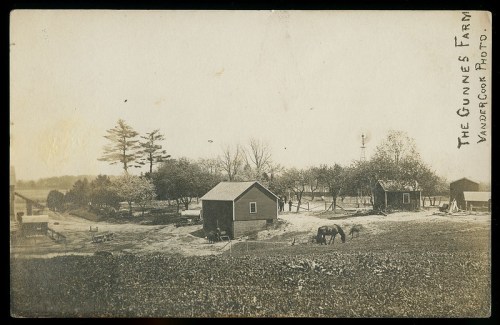 A vintage photo of Gunnes Farm, featuring a horse, buildings, and trees in a rural landscape.