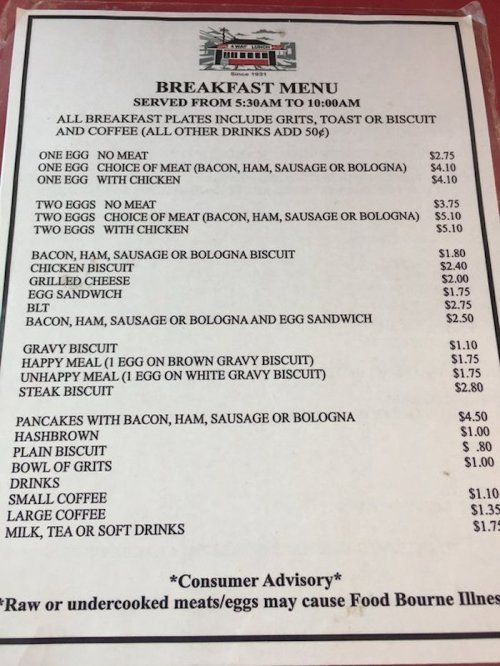 Breakfast menu featuring various egg, meat, and biscuit options, served from 5:30 AM to 10:00 AM.
