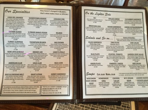Menu featuring various sandwiches, salads, and soups, including specialties like the "Smoky Joe" and "Chicago Fire."