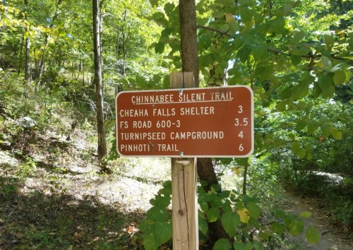 Trail sign for Chinnabee Silent Trail with distances to Cheaha Falls Shelter, FS Road 600-3, Turnipseed Campground, and Pinhoti Trail.