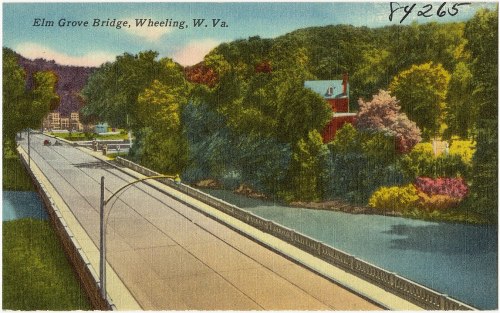 A vintage postcard of Elm Grove Bridge in Wheeling, West Virginia, surrounded by lush greenery and a river.