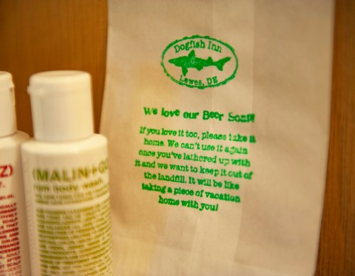 A note from Dogfish Inn in Lewes, DE, encouraging guests to take home unused soap to reduce waste.