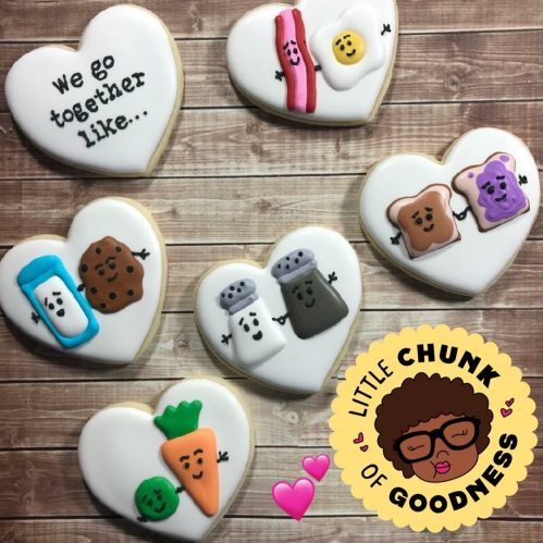 A collection of heart-shaped cookies featuring cute food characters and playful phrases about friendship.