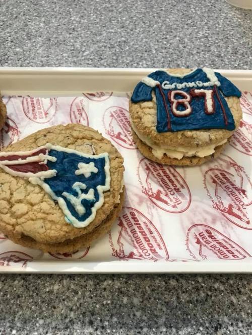 Two large cookies decorated with a New England Patriots logo and a jersey with the name "Gronk" and number "87."