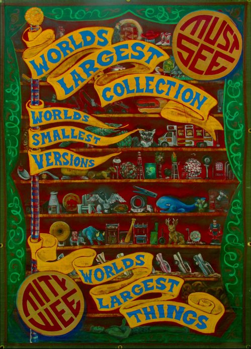 Colorful sign featuring text about the "World's Largest Collection of the World's Smallest Versions" and "World's Largest Things."