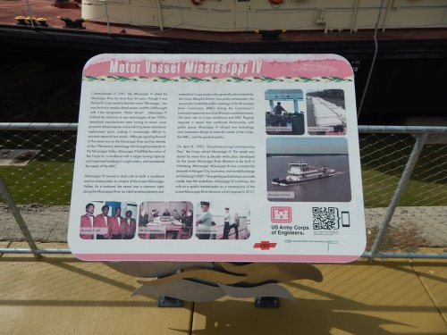 Sign about the Motor Vessel Mississippi IV, detailing its history and significance, with images and QR code.