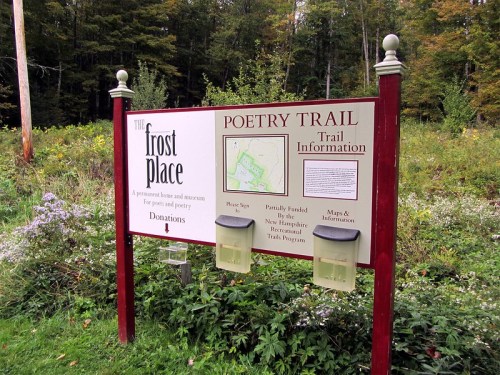 Sign for the Frost Place Poetry Trail, featuring maps and information about the trail and donation details.