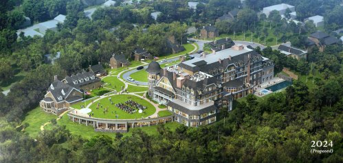 Aerial view of a proposed large mansion complex surrounded by greenery, featuring gardens and outdoor gathering spaces.