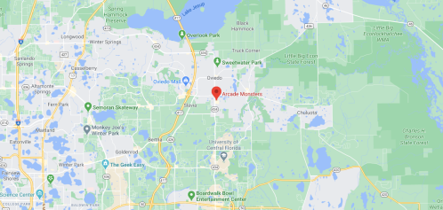 Map showing the location of Arcade Monsters near Oviedo, Florida, with nearby parks and landmarks indicated.
