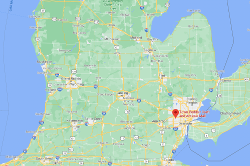 Map of Michigan highlighting the location of Town Peddler Craft and Antique Mall near Detroit.