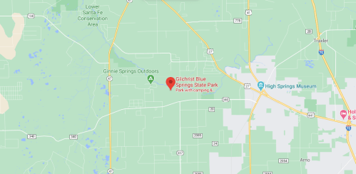 Map showing Gilchrist Blue Springs State Park, highlighting nearby areas and roads.