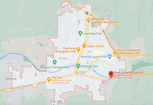Map of Grants Pass, Oregon, highlighting River's Edge Restaurant and nearby landmarks and parks.