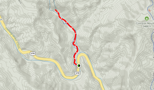 Map showing a winding trail marked in red along a river, with contour lines indicating elevation changes.