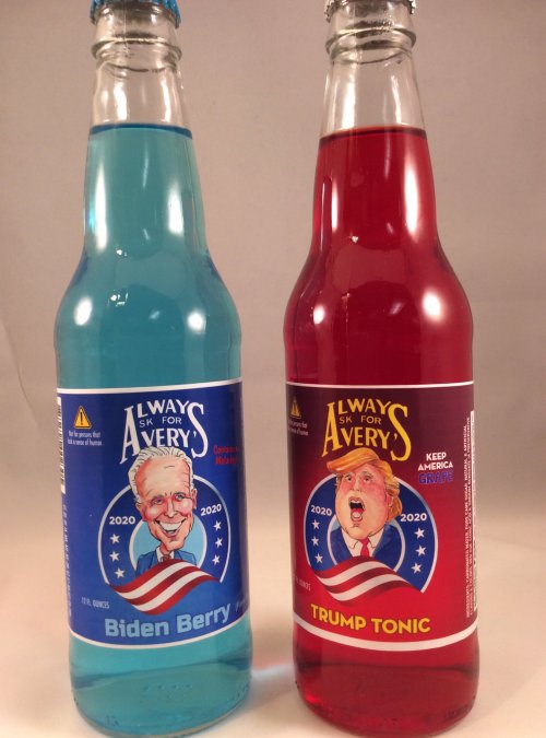 Two colorful soda bottles: one blue labeled "Biden Berry" and one red labeled "Trump Tonic," both with cartoonish designs.