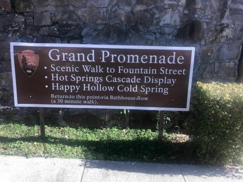 Sign for the Grand Promenade, listing attractions and a return route via Bathhouse Row.