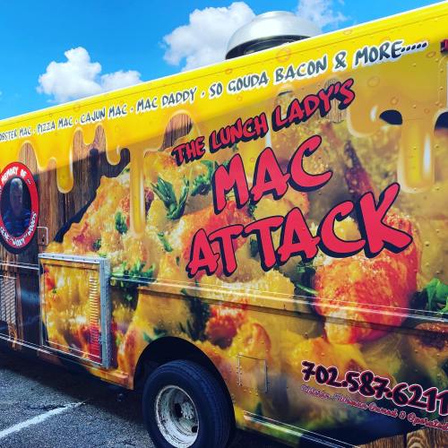 A colorful food truck featuring "The Lunch Lady's Mac Attack" with images of cheesy mac and various toppings.