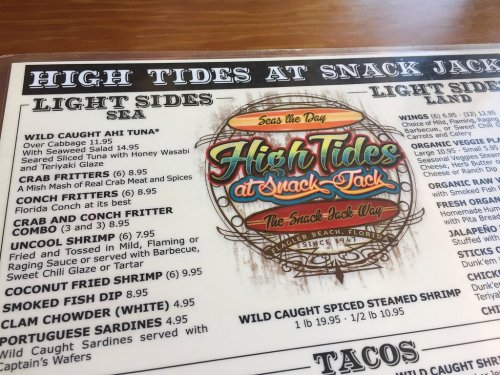 Menu for High Tides at Snack Jack featuring seafood dishes and prices, including crab fritters and clam chowder.