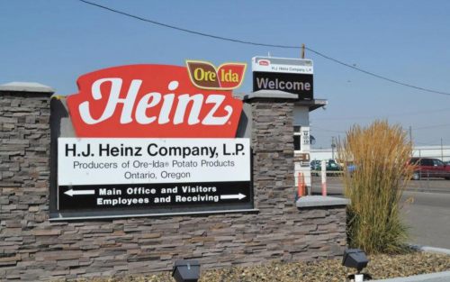 Sign for H.J. Heinz Company, featuring Ore-Ida products, located in Ontario, Oregon, with a welcome message.