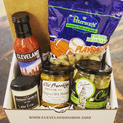 A gift box filled with Cleveland Ketchup, snacks, mustard, cheese, and pickles. Perfect for local flavor lovers!
