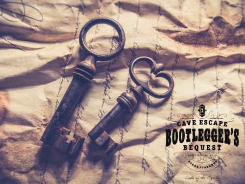 Two vintage keys on aged parchment paper with handwritten notes, featuring "Cave Escape Bootlegger's Bequest" logo.