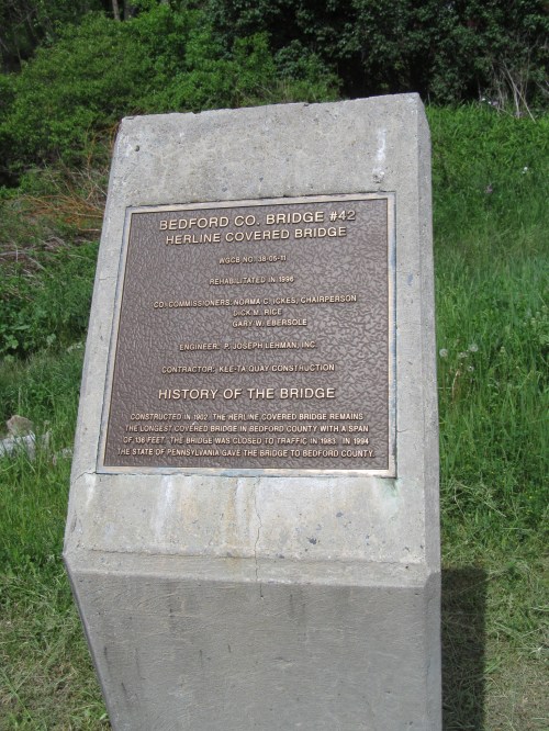 Plaque detailing the history and rehabilitation of Bedford Co. Bridge #42, a covered bridge in Pennsylvania.