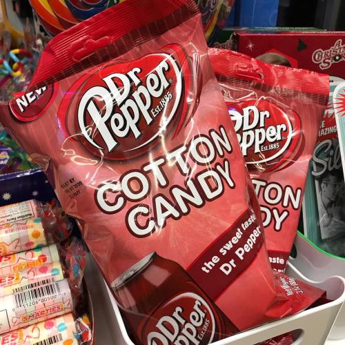 A bag of Dr Pepper cotton candy, featuring a bright pink design and the brand logo prominently displayed.