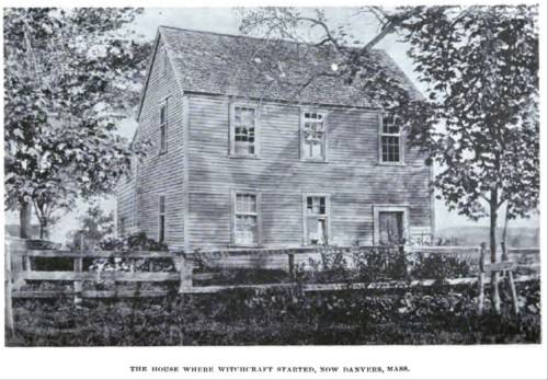 Historic house in Danvers, Massachusetts, associated with the origins of witchcraft, surrounded by a wooden fence and trees.