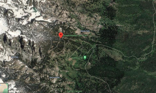 Map showing the location of Amphitheater Lake Trail, surrounded by mountains and trails in a forested area.
