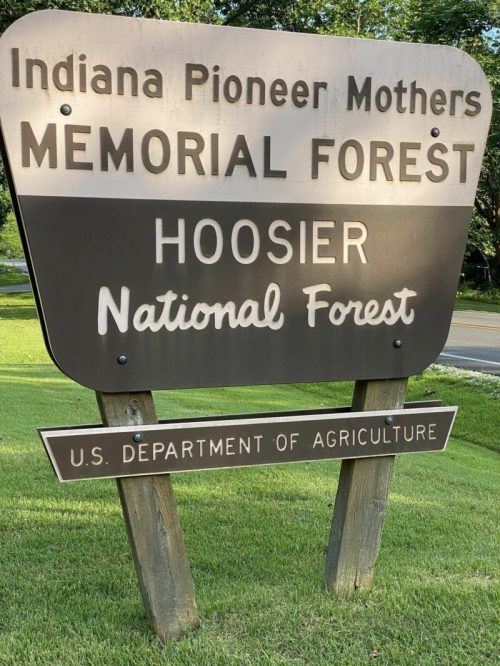 Sign for Indiana Pioneer Mothers Memorial Forest in Hoosier National Forest, U.S. Department of Agriculture.