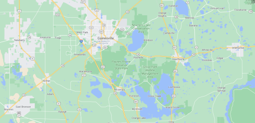 Map of Gainesville, Florida, highlighting nearby parks and natural areas, including Paynes Prairie Preserve State Park.