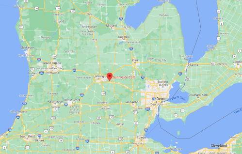 Map showing the location of Sunnyside Cafe in Lansing, Michigan, surrounded by nearby cities and highways.