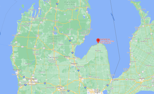 Map showing northern Michigan with a marker for Garfield Inn near Lake Huron.