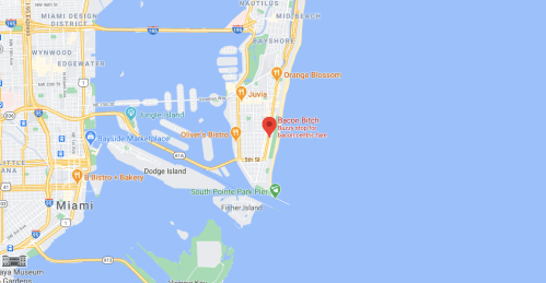 Map of Miami highlighting the location of Bacon Bitch, near the waterfront and various nearby attractions.