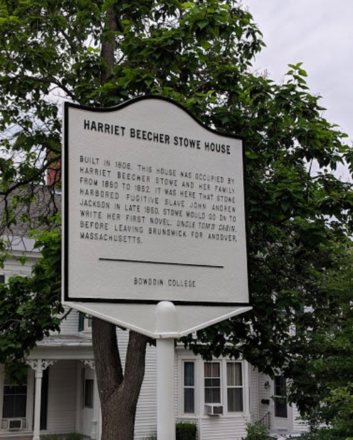 Sign for the Harriet Beecher Stowe House, detailing its history and significance in Brunswick, Maine.