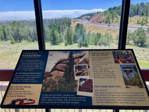 Information display about Vedauwoo and Curt Gowdy State Park, highlighting outdoor activities and scenic views.
