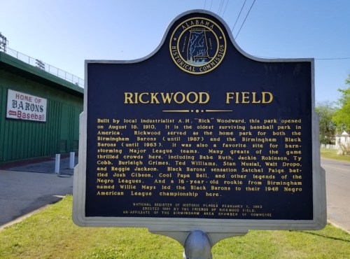 Historical marker for Rickwood Field, the oldest surviving baseball park in America, highlighting its significance and notable players.
