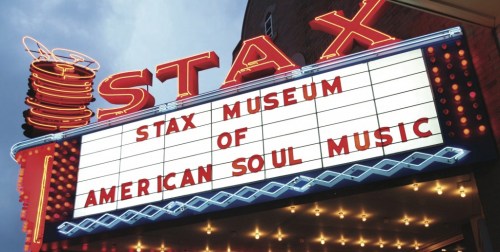 Neon sign of the Stax Museum of American Soul Music, featuring bold letters and a colorful marquee.