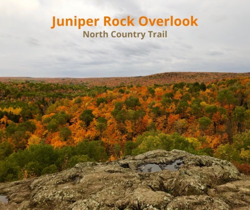 Scenic view from Juniper Rock Overlook, showcasing vibrant fall foliage along the North Country Trail.