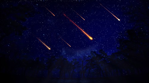 A night sky filled with shooting stars over a dark forest, illuminated by a starry backdrop.