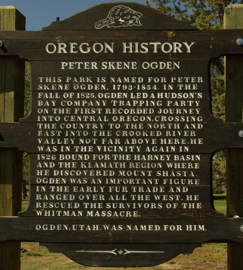 Sign detailing the history of Peter Skene Ogden and his contributions to the Oregon region in the 1800s.