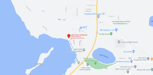 Map showing Lake Harris Hideaway and nearby locations, including schools and businesses in the area.