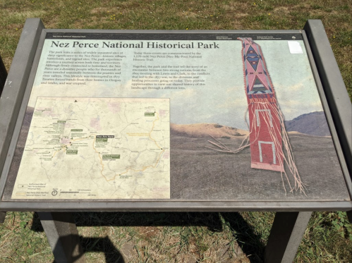 Sign for Nez Perce National Historical Park featuring a map and information about the park's history and significance.
