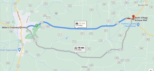 Map showing two routes from Miller's Creamery to Berlin Village Antique Mall, with estimated travel times and distances.