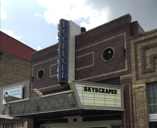 Historic theater marquee reading "ROCKFORD" with "SKYSCRAPER" on the display, featuring a classic architectural design.