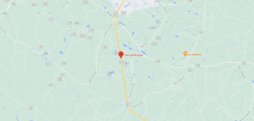 Map showing the location of "The Farmhouse" along with nearby roads and landmarks.