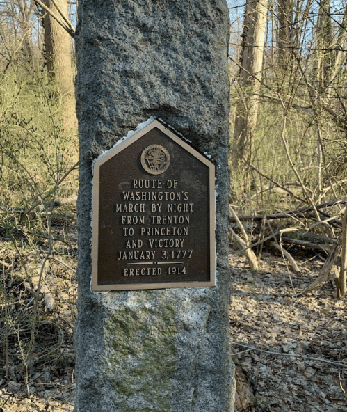 Plaque on a stone marking Washington's march route from Trenton to Princeton, dated January 3, 1777, erected in 1914.