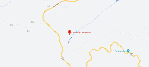Map showing the location of KP Cheneaga Campground, marked with a red pin, surrounded by winding roads.