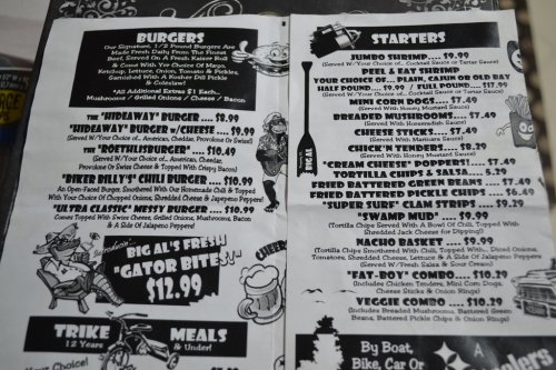 Menu page featuring burgers and starters with prices, including items like "Hideaway Burger" and "Jumbo Shrimp."